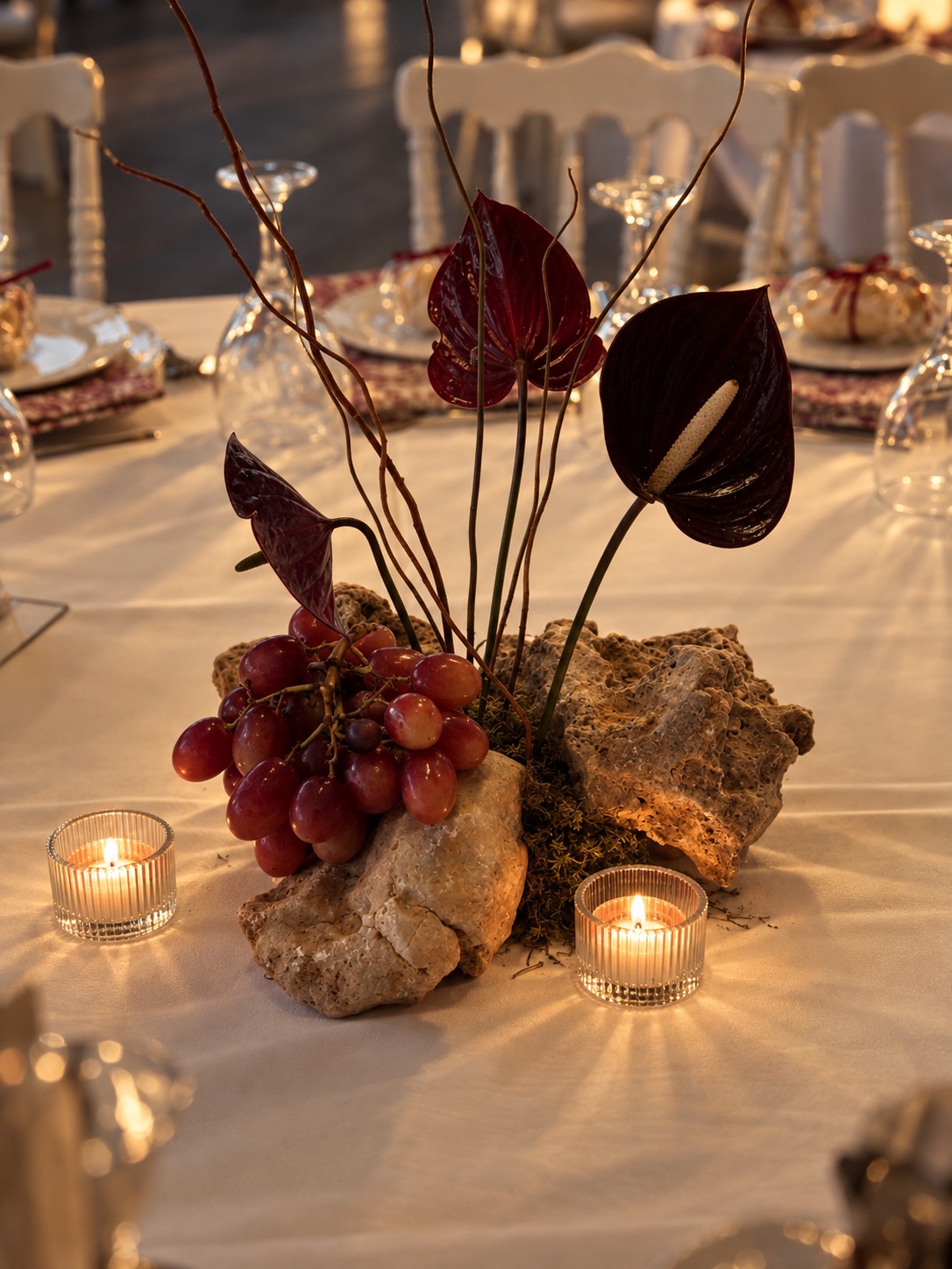 Sculptural anthurium and grape centrepiece — Patric and Alexia